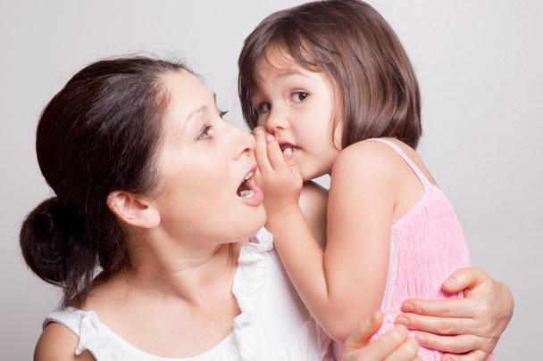 Grandmother and granddaughter gossiping - Photo, Image