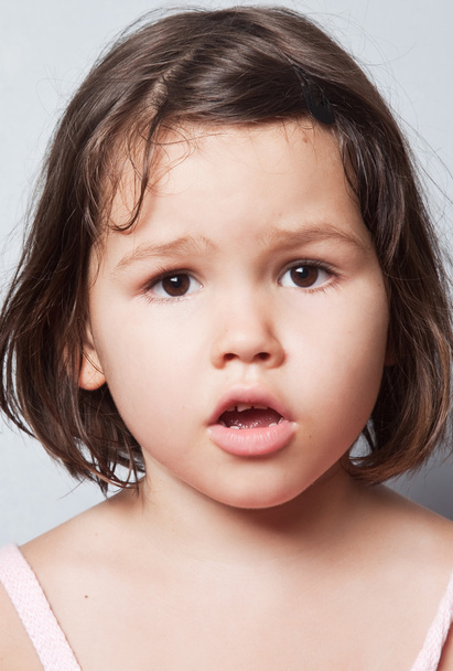 Little girl complains and surprise - 写真・画像