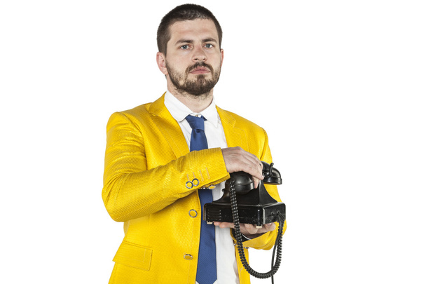 Geschäftsmann im goldenen Anzug legt das Telefon auf - Foto, Bild
