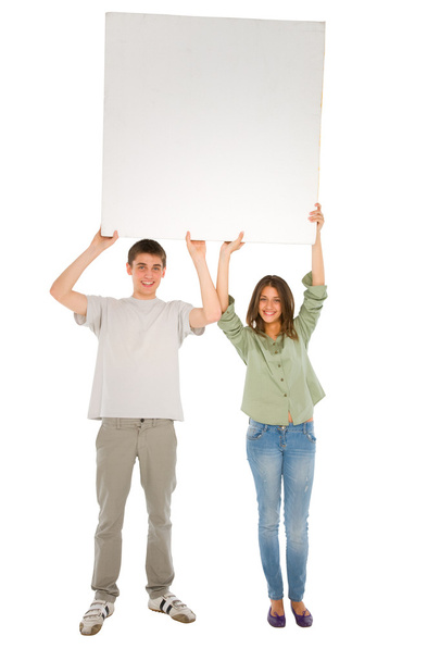 Couple of teenagers with white panel - Фото, изображение