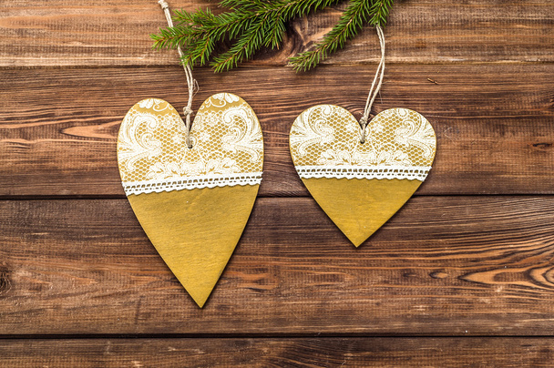 Hanging decoration on christmas tree on wooden background, overhead - Foto, immagini