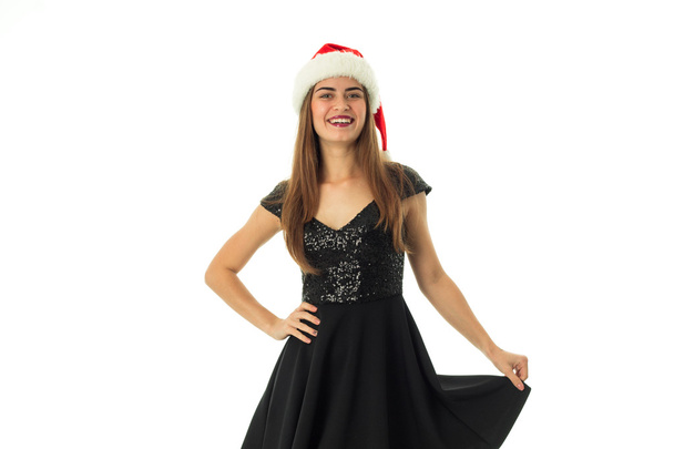 portrait of happy attractive girl in santa hat - Foto, Imagem