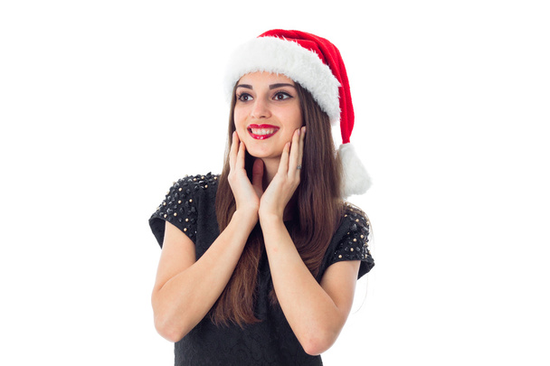 brunette girl in santa hat - Photo, image
