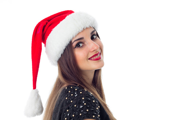 cheerful brunette girl in santa hat - Fotoğraf, Görsel