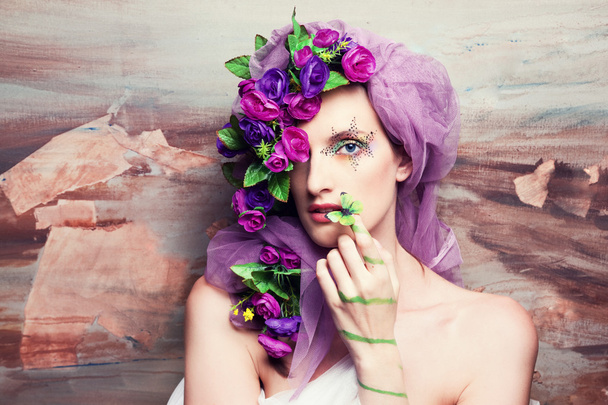 Portrait of a woman in flowers - Fotografie, Obrázek