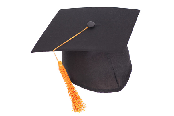 Black Graduation Hat with Gold Tassel isolated on white backgrou - 写真・画像