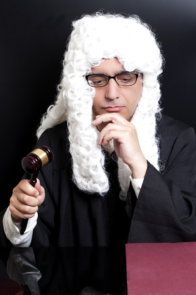 Portrait Of Male Lawyer with eyeglasses Holding Judge Gavel  - Foto, afbeelding