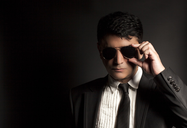 Business man in suit with sunglasses  - Fotó, kép