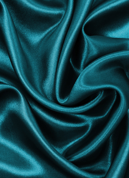 Smooth elegant blue silk or satin as background - 写真・画像