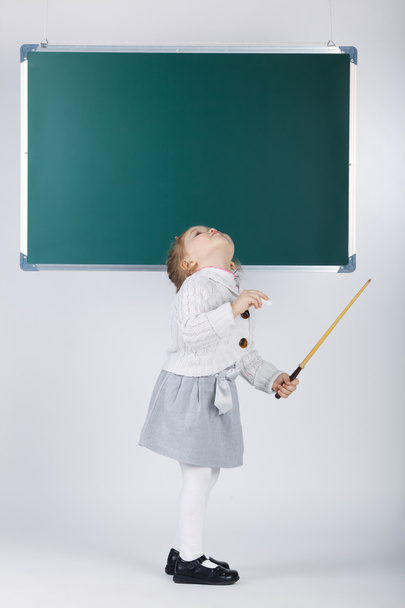 cute little girl with blackboard - Valokuva, kuva