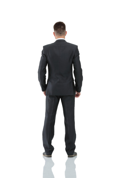 Businessman from the back - looking at something over a white ba - Фото, зображення