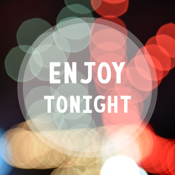 Enjoy tonight on colorful bokeh background - Foto, Bild