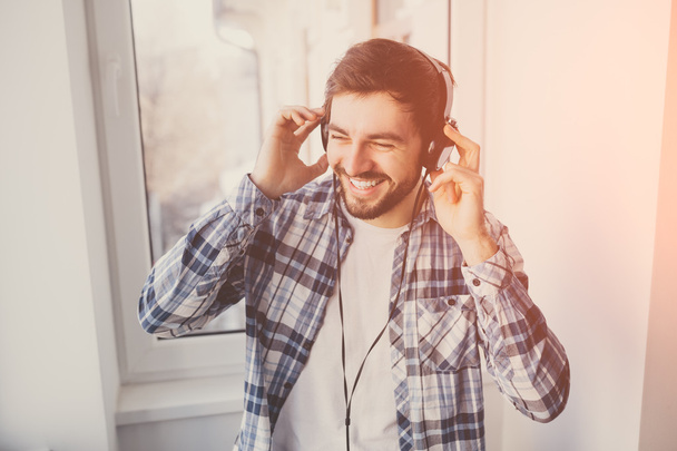 man with headphones listening to music - Fotó, kép