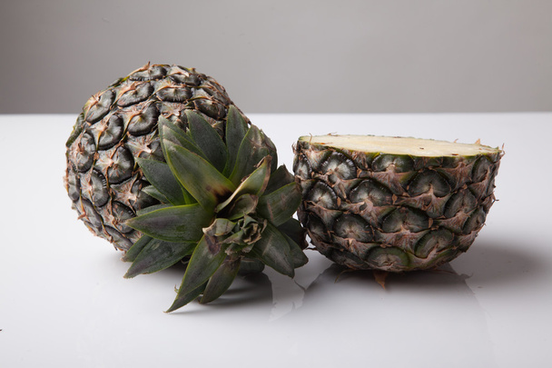 Half cut fresh pineapple - Фото, изображение