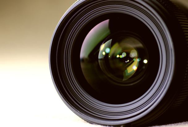 toned monochrome background of lens flare object - Photo, Image