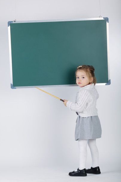 cute little girl with blackboard - Φωτογραφία, εικόνα