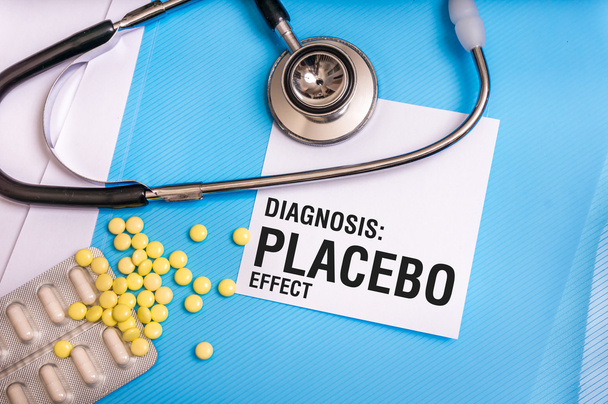 Placebo effect words written on medical blue folder - Foto, Imagen