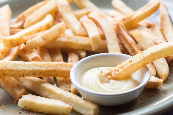 French fries. Potatoes cut into strips and deep-fried. Selective focus and close up - Fotoğraf, Görsel
