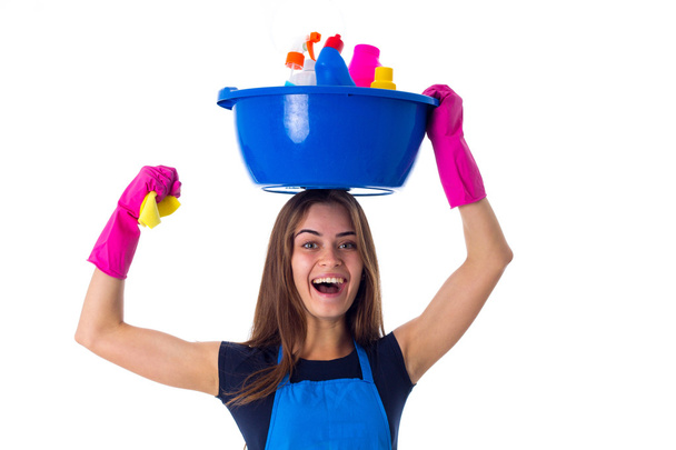 Woman holding cleaning things in washbowl - Photo, Image