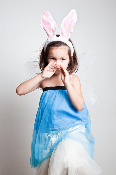 Girl dresses up in bunny ears - Foto, afbeelding