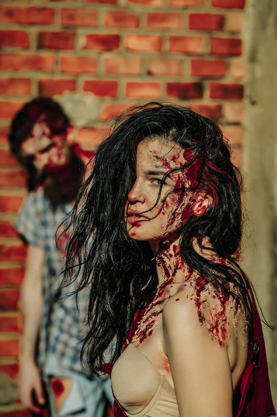 Zombie girl and bearded man - Foto, afbeelding