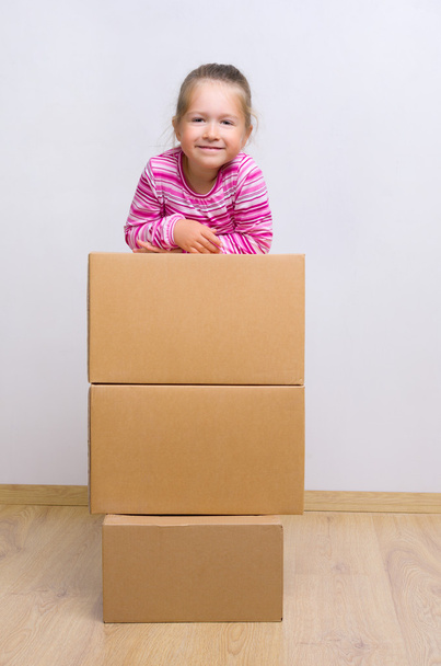 Little girl with boxes - 写真・画像