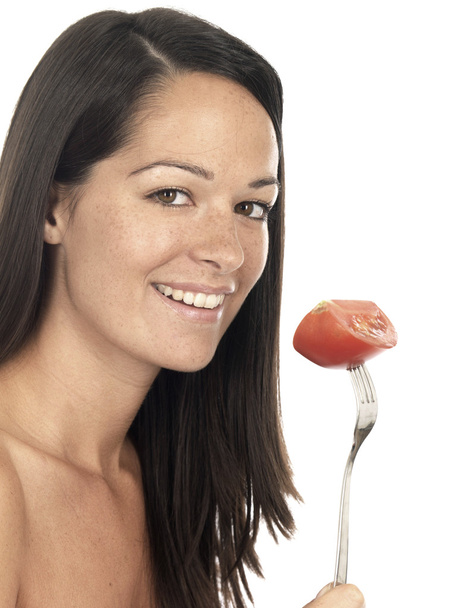 biftek domates tutan genç kadın - Fotoğraf, Görsel