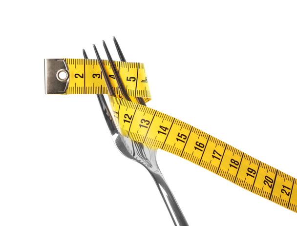Fork with measuring tape - Φωτογραφία, εικόνα