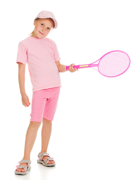 little girl with plays tennis - Foto, afbeelding