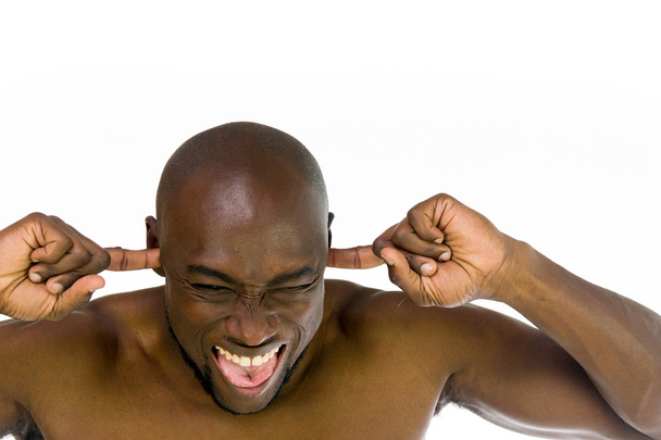 african american man plugging ears  - Fotoğraf, Görsel