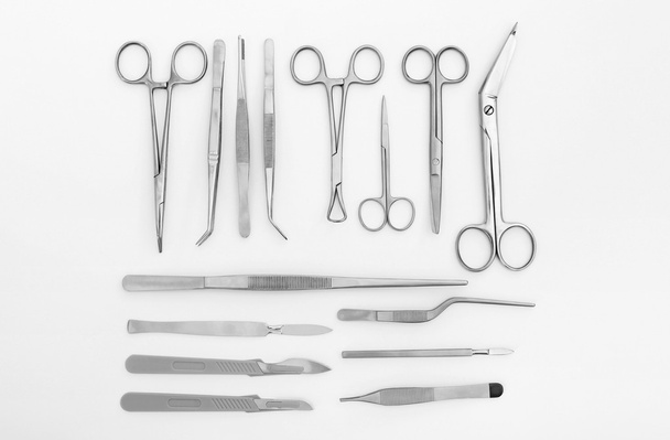 Flat lay of medical instruments on white background - Valokuva, kuva