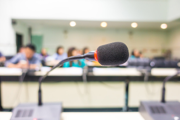 Black microphone in conference room ( Filtered image processed v - Zdjęcie, obraz