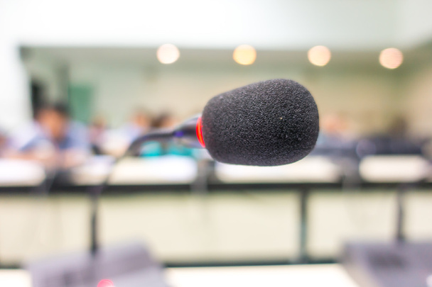 Black microphone in conference room ( Filtered image processed v - Zdjęcie, obraz