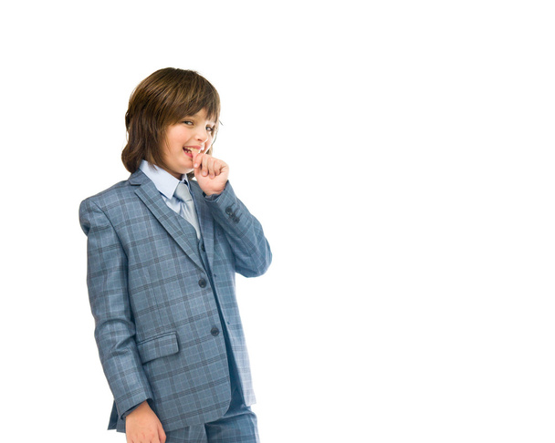 teenage businessman biting nails - 写真・画像