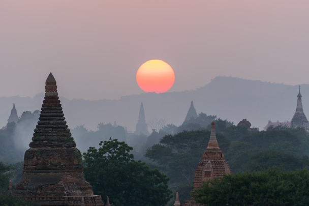 Sun set over pagoda - Photo, Image
