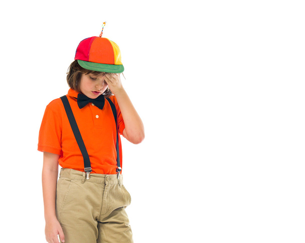 clown teenage boy has headache - Foto, afbeelding