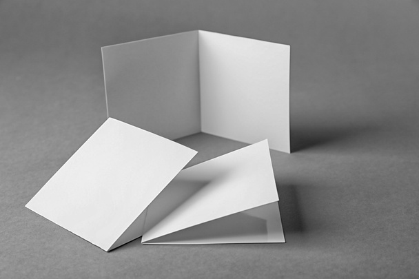 Blank booklets on grey background - Fotoğraf, Görsel
