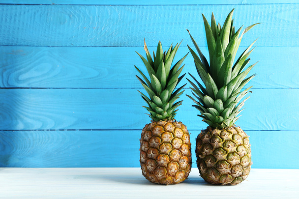 Ripe pineapples on  table - Photo, Image