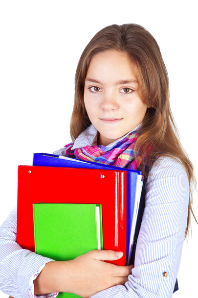 Teenager with backpack and books isolated over white - Foto, Bild