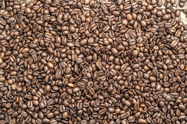 Жареный кофе в зернах текстура фона - Фото, изображение