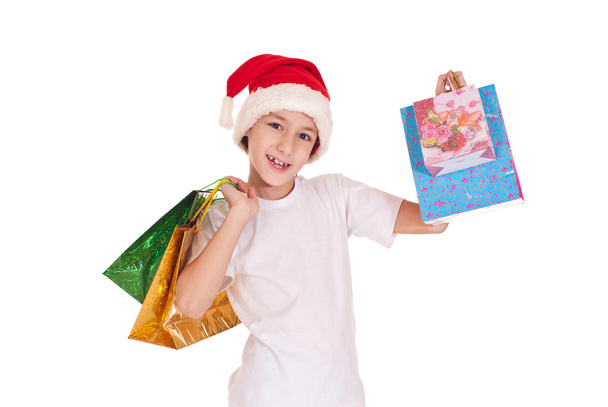 Хлопчик з різдвяними сумками
 - Фото, зображення