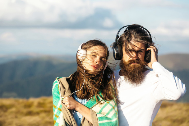 Young couple with headphones - Zdjęcie, obraz