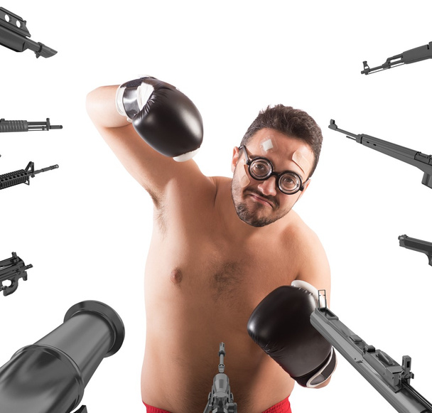  weapons pointed on a goofy boxer - Photo, Image