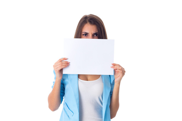 Woman holding white sheet of paper - Foto, Bild