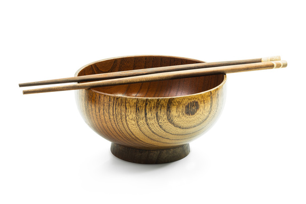 Fából készült bowl és elszigetelt pálcika - Fotó, kép