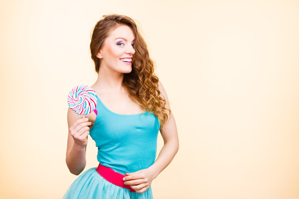 Woman joyful girl with lollipop candy - Foto, Bild