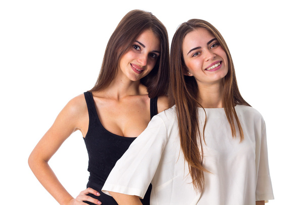 Two young woman standing and smiling - Photo, Image