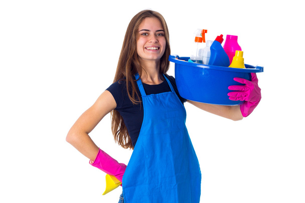 Nő a gazdaság tisztítási dolgokat mosdótál - Fotó, kép