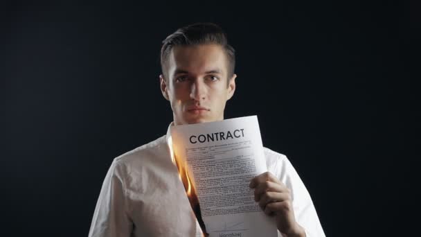 Slow-motion of a businessman bearning a contract - Materiaali, video