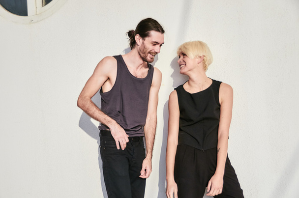 fashion man and girl in a black clothes - Valokuva, kuva